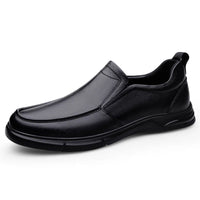 Men’s moccasins shoes, black leather, slip-on style, sleek design, comfortable fit, against a white background