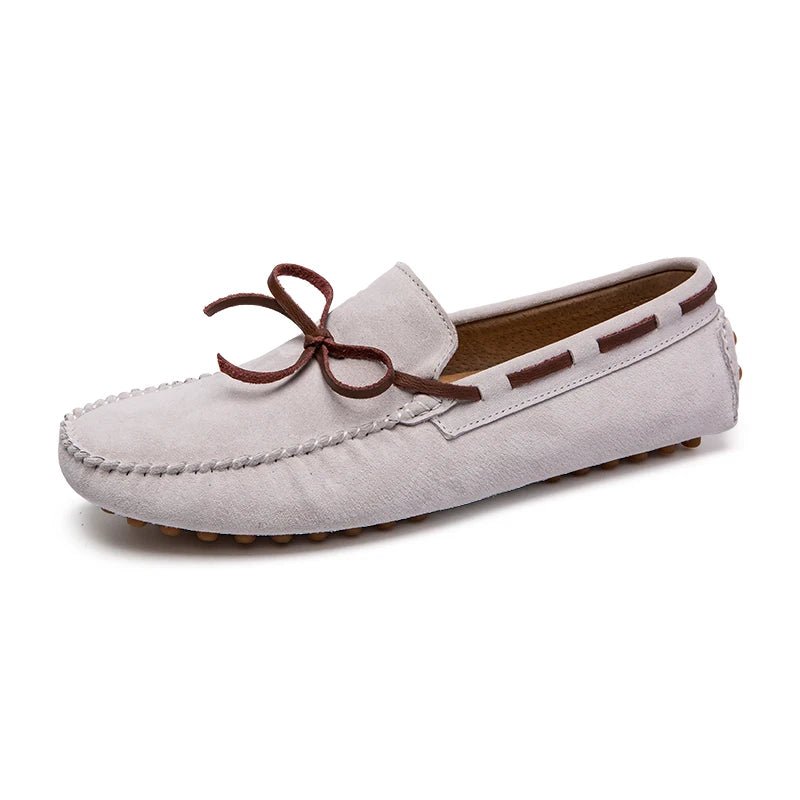 Men’s penny loafers in Beige, sleek design with brown laces, stitched detailing, comfortable fit.