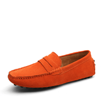 Men’s loafers in vibrant orange suede, slip-on design with a sleek, modern look, isolated on a white background