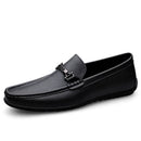 black  Men’s Summer Loafers with a sleek design and silver buckle, embodying elegance and comfort for stylish summer wear