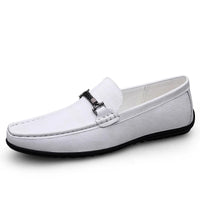 Men’s Summer Loafers: Elegant white loafers with a metal ornament, epitomizing summer style and comfort.