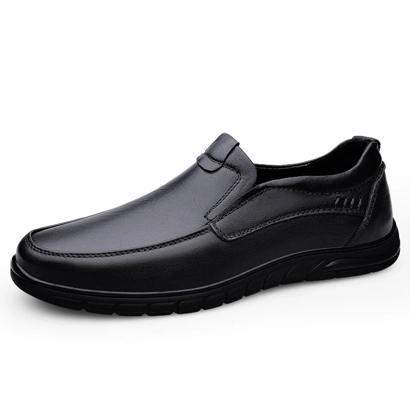 Men’s walking loafers in sleek black, featuring a slip-on design, stitched detailing, and a comfortable sole