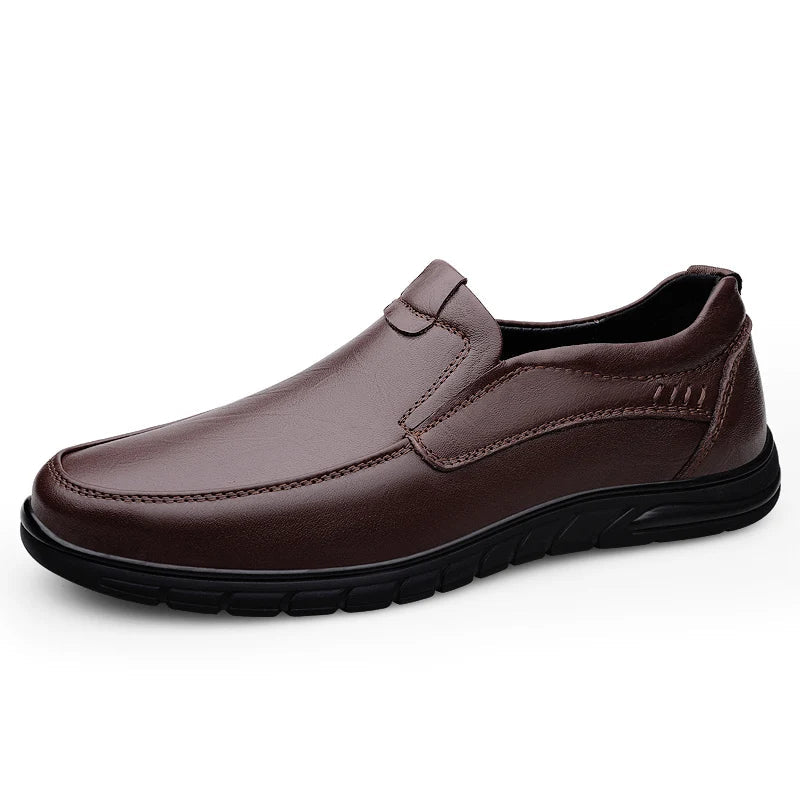 Men’s walking loafers in brown, slip-on style with detailed stitching and black soles