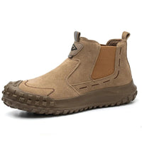 Tan suede Welder boots, ankle-high with rugged sole, symbolizing durability and comfort